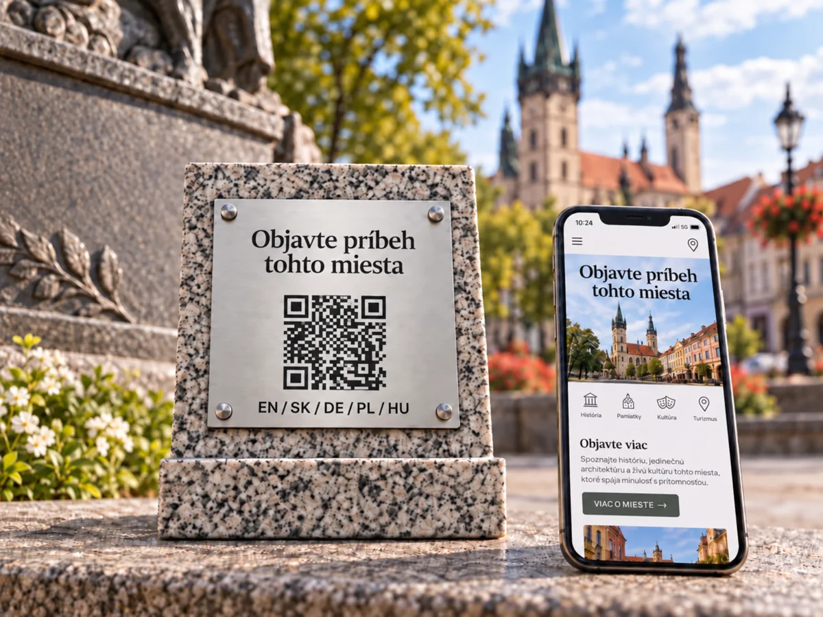 Ilustračná tabuľka Objavte príbeh tohto miesta na kamennom podstavci s mobilom a piatimi jazykmi